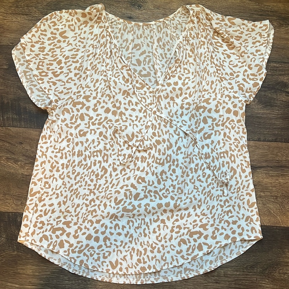 Leopard top with string detail at neck